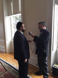 Rabbi Sadwin being interviewed by WBAL news anchor Robert Lang