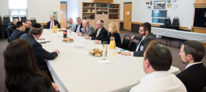 Rabbi Avi Schnall, Agudath Israel's NJ director discussing the importance of the security bill with Senator Peter Barnes D(18); Assemblyman Patrick J. Diegan Jr. (D-18); Assemblyman Gary Schaer (D-36); Assemblywomen Nancy Pinkin (D-18) and school leaders and administration at the Rabbi Pesach Raymon Yeshiva in Edison