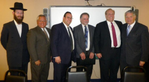 Rabbi Balsam; Gus Kavakas; Rabbi Avi Schnall, Agudath Israel's NJ director; State Monitor Mike Azzara; Commissioner David Hespe; Senator Robert Singer (R-Monmouth)