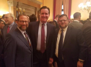 Agudath Israel board of trustee members, Leon Goldenberg and Chaskel Bennett congratulate NYS Senate Majority Leader John Flanagan