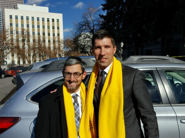 Rabbi Ahron Wasserman of Denver thanking the chairman of the Colorado Senate Education Committee Senator Owen Hill, for his strong support of school choice